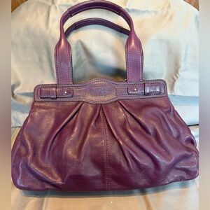 Coach Eggplant colored purse.